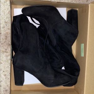 High heel, knee length boots